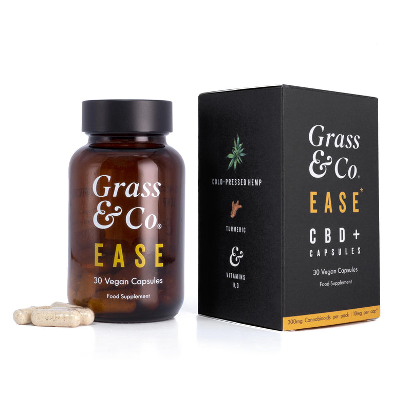 EASE CBD capsules for pain relief next to packaging